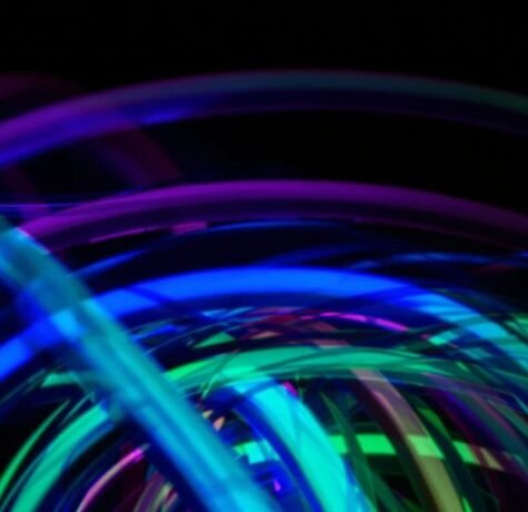 Vibrant neon glow illuminating a dark backdrop.