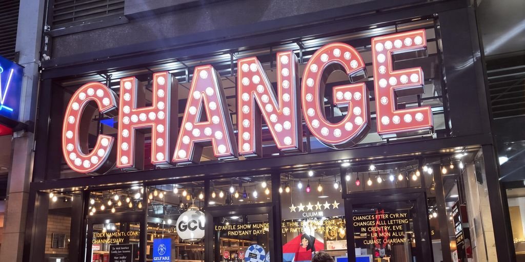 Brightly lit retail storefront with customizable message display.