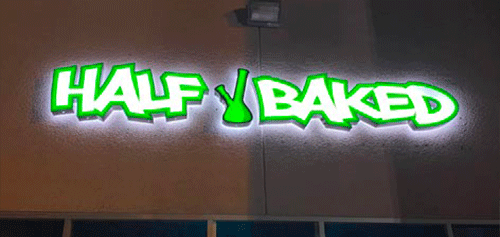 Day and night view of illuminated channel letter signage